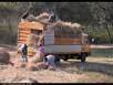 Loading hay onto truck 