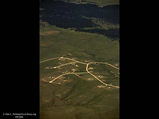 Urban sprawl reaching out (aerial), Western USA